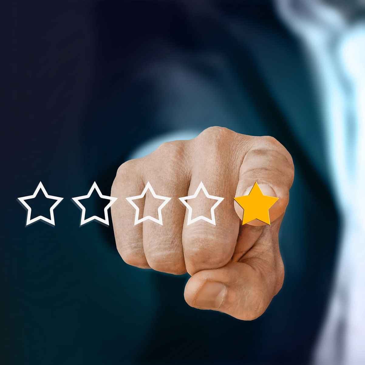 A finger pointing at the fifth star in a line of five, an example of the reputation side of the property management marketing solutions offered by Fourandhalf A finger pointing at the fifth star in a line of five, an example of the reputation side of the property management marketing solutions offered by Fourandhalf