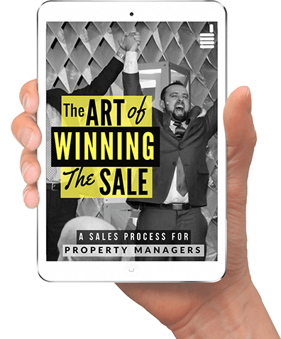A hand holds an ipad with the image of Fourandhalf's ebook "The Art of Winning The Sale", a useful tool for those seeking property management marketing A hand holds an ipad with the image of Fourandhalf's ebook "The Art of Winning The Sale", a useful tool for those seeking property management marketing