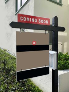 A sign in front of a rental property says "Coming Soon"