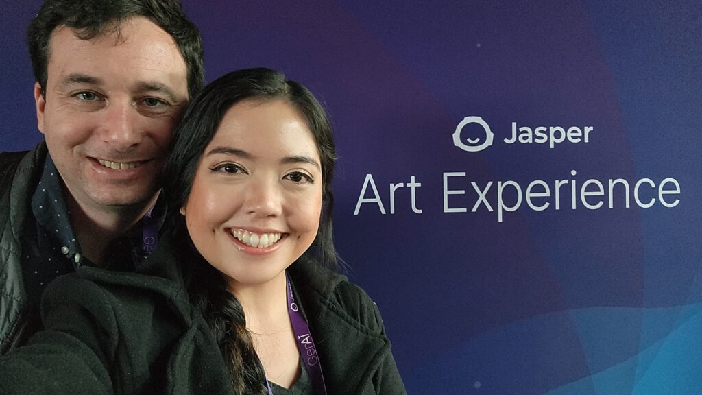 Marie and Ziv at Jasper Art Experience Sign
